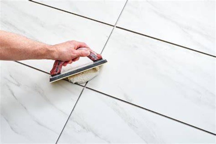 Can you grout same day as tile?